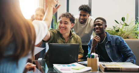 Business, team and laptop with high five in meeting for campaign success, ad performance or goals. Graphs, marketing manager and excited people with celebration at agency for KPI stats and good news