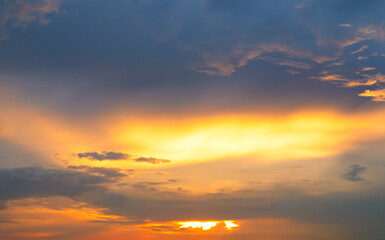 Fototapeta premium Sky sunset evening sunrise cloud weather dramatic landscape goldent and indigo color gradient pastel horizon, twilight yellow golden reflection morning nature environment energy ecosystem change