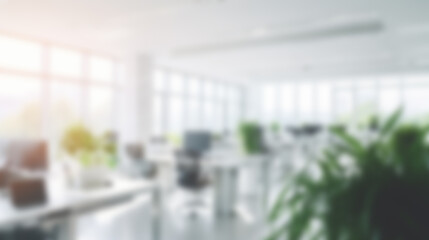 Bright Blurred Modern Open Plan Office Background with Natural Light and Green Plants