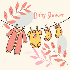 Pink baby clothes on a rope line illustration for a newborn shower invitation card