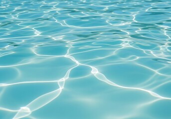 Fototapeta premium Clear blue water with sun reflections