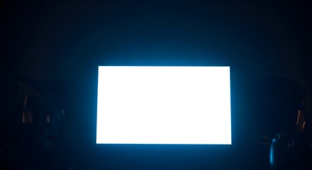 Bright Glowing Screen in Dark Room