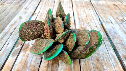 Close-up of fresh green mussels clustered together, emphasizing their natural colors, clean...