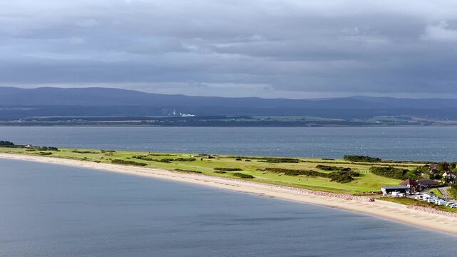 Aerial Pan of Rosemarkie Beachfront and Coastal Village in Scotland