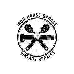 Iron Horse Garage Vintage Repairs Logo with Crossed Wrenches and Bolt.