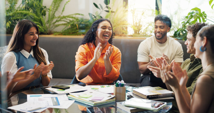 Creative, excited team and applause in meeting for KPI metrics, brand performance and good news. Marketing, graph paperwork or people with celebration at agency for campaign success or pitch approval