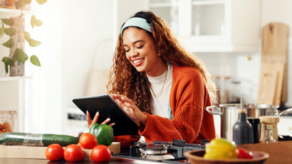 Happy, woman and cooking with tablet in kitchen, vegetables and research for recipe and...