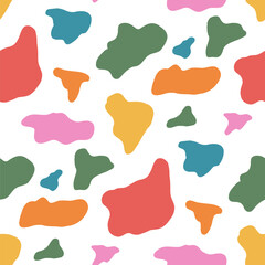 Multicolor seamless cow print pattern with orange, blue, green, and pink blobs. Spot freeform shape and irregular modern look. Kids abstract vector seamless pattern. Simple animal skin design.