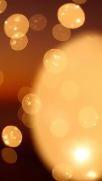Beautiful cinematic soft focus background featuring drifting golden hour bokeh light orbs shimmering gently in slow motion elegance, subtle, peaceful