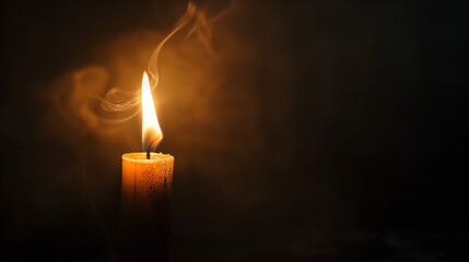 Red candle on black background