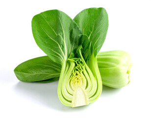 Fresh bok choy cut open showing inner layers on white surface