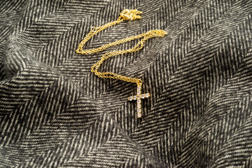 The cross-shaped necklace is a perfectly designed accessory.