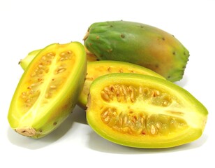Prickly pears sliced open revealing juicy pulp on a white surface