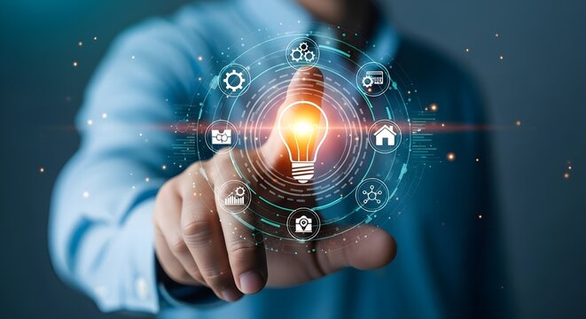 Businessman touching digital interface with light bulb and technology icons