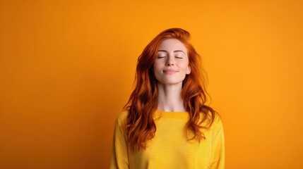 Redhead woman with closed eyes smiling