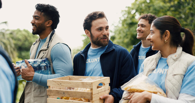 Donations, volunteering and people with help, outdoor and discussion with community outreach. Charity mission, group or friends in park, NGO project or teamwork with unity, food aid or poverty relief