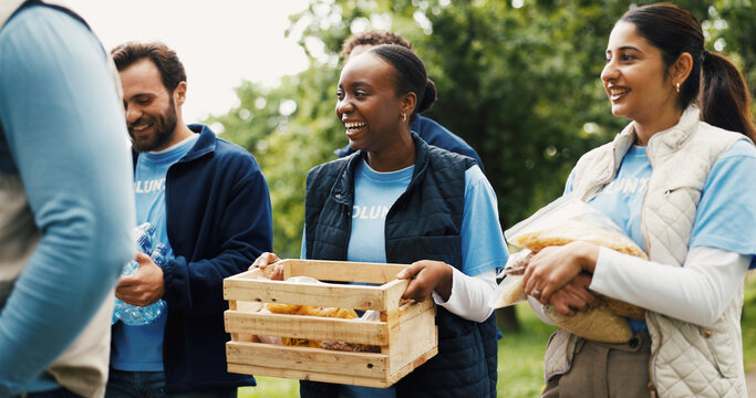 Food, donation and team of people in park for volunteer, community service or ngo project. Nonprofit support, grocery distribution and charity drive with men and women outdoor for outreach program