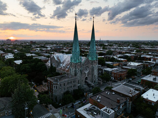 Sunset aerial view of church spires over Montreal cityscape. g.