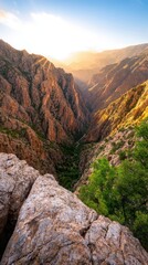 Fototapeta premium Stunning Sunrise Over Majestic Canyon Landscape with Rocky Outcrops