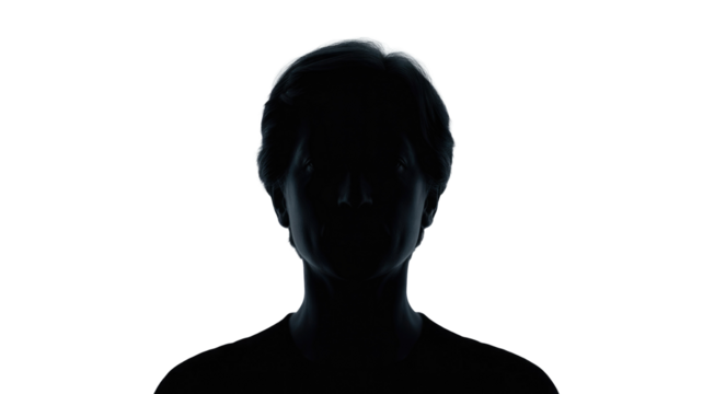 Mysterious silhouette of a person's head and shoulders against a dark transparent background, emphasized by strong backlighting creating a glowing halo effect. background removed - Powered by Adobe