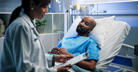 Doctor, clipboard and man in hospital bed, discussion and feedback for diagnosis. Medical service,...
