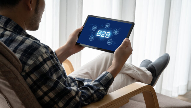 Business person navigates B2B landscape, harness technology to enhance business-to-business connections. Discover reshapes B2B interaction, driving innovation in business-to-businesses strategy. brisk - Powered by Adobe