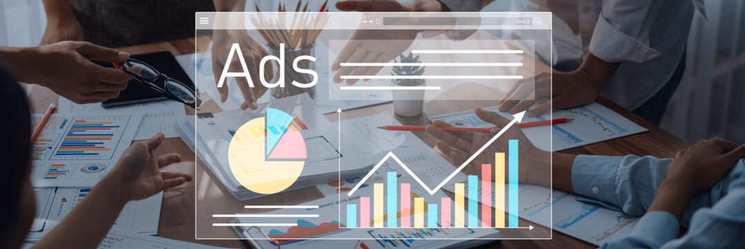 A dynamic business meeting showcasing teamwork on advertising strategies with graphs and charts to analyze marketing performance and drive effective decision-making. Trope - Powered by Adobe