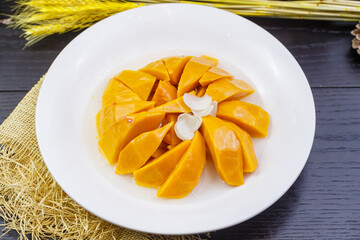 Honey-drizzled lily and mini pumpkin