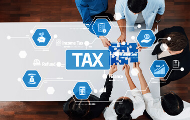A diverse group of professionals engages in a strategic meeting focused on tax incentives and financial analysis, utilizing technology to enhance collaboration and decision-making. Amity