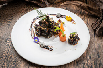 Black pepper squid ink yak cubes