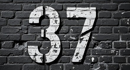 Distressed Number 37 on a Textured Brick Wall Urban Typography and Grunge Aesthetic