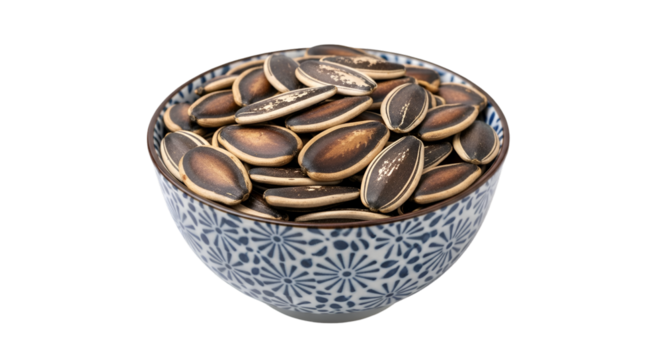 Delicious roasted sunflower seeds in a charming blue patterned bowl, perfect for healthy snacking and culinary enjoyment for foodies everywhere
