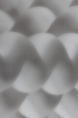 Grey blurred soft wavy lines on metallic surface background