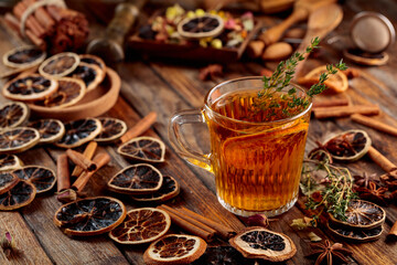 Herbal tea with thyme and dried citrus.