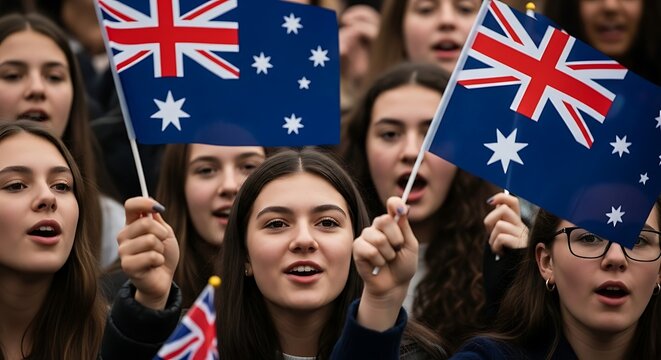 Enthusiastic crowd celebrates australia day with flags, showing patriotism and national pride in unity and joy