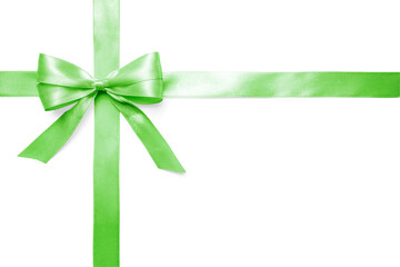 Green satin bow and ribbon isolated on white background. Perfect mockup for Christmas, eco and spring celebration designs.