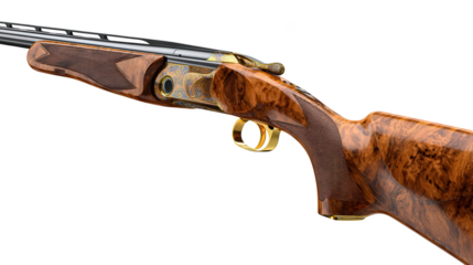 An exquisitely detailed rifle with ornate gold and blue engravings features a polished wooden stock