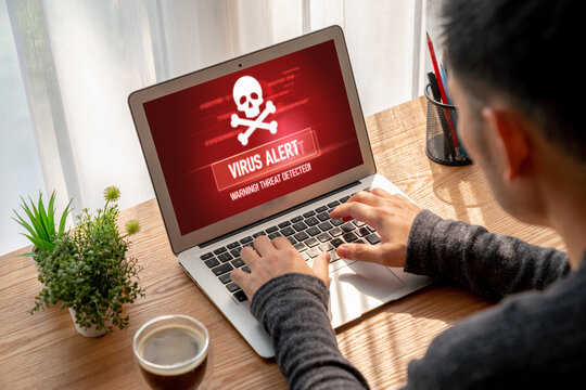 Virus warning alert on computer screen detected modish cyber threat , hacker, computer virus and malware