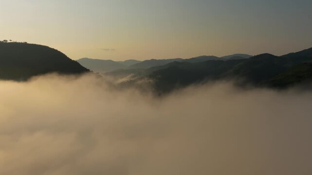 Foggy Clouds Engulfing Mountains Above The Reservoir Of Presa EL Carrizo In Tamazula de Gordiano, Jalisco, Mexico. Aerial Drone Shot
