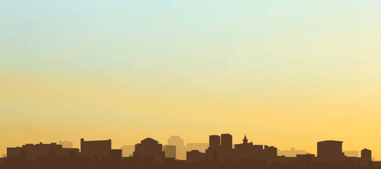Panoramic poster of the city skyline with misty background buildings, hills sunrise, sunset and clouds of ZARAGOZA, SPAIN