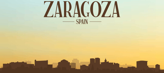 Panoramic poster of the city skyline with misty background buildings, hills sunrise, sunset and clouds of ZARAGOZA, SPAIN