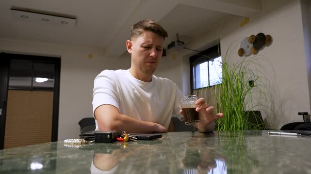 Man Disgusted by Burnt Coffee Smell. Close Up