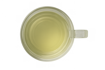 Green tea in glass mug seen from above, hot healthy drink for wellness and detox on transparent background