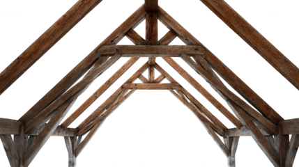 Old wooden beams form a rustic roof structure overhead against a dark sky