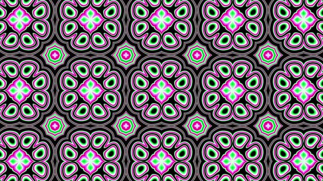 Geometric kaleidoscope pattern with pink, green, and gray glowing symmetrical shapes.