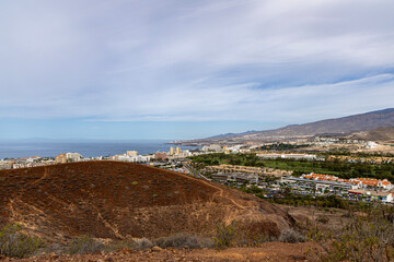 Panorama of the city of Las Americas with a volcano in the background. Tenerife, Canary Islands.