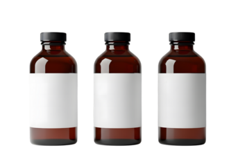 Three brown bottles with white labels and black caps on a black background