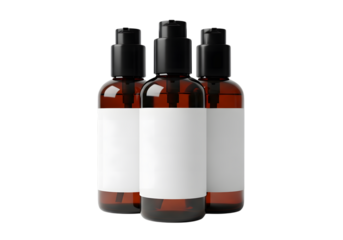 Three amber bottles with black pump tops and white labels on a black background