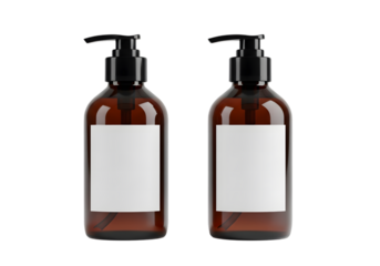 Two brown pump bottles with blank white labels on a dark background studio shot