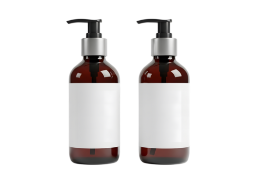 Two brown bottles with pump dispensers and blank labels on a black background